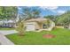 Charming single-story home with well-maintained lawn, landscaping, and a welcoming front entrance at 1371 Lake Dr, Casselberry, FL 32707