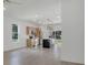 Open-concept kitchen with an island, stainless steel appliances, and modern light fixtures at 1371 Lake Dr, Casselberry, FL 32707