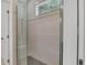 Walk-in shower with glass enclosure, tiled walls, and modern fixtures at 1371 Lake Dr, Casselberry, FL 32707