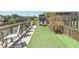 Waterfront dock featuring artificial turf, barstool seating, and space for entertaining at 139 Randle Ave, Oak Hill, FL 32759