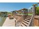 Multi-level waterfront dock and boat lift offering outdoor space and access to the water at 139 Randle Ave, Oak Hill, FL 32759