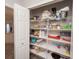 Organized pantry with wire shelving and ample storage space for food and household items at 139 Randle Ave, Oak Hill, FL 32759