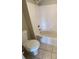 Clean bathroom with a tub-shower combo and neutral tiling, offering essential amenities at 14025 Fairway Island Dr # 335, Orlando, FL 32837