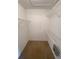 Walk-in closet featuring wire shelving, providing ample storage space in an uncluttered area at 14025 Fairway Island Dr # 335, Orlando, FL 32837