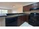 Kitchen offering stainless steel sink, modern appliances, and an open layout at 14025 Fairway Island Dr # 335, Orlando, FL 32837
