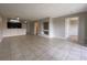 Open living space with tile flooring leading into the kitchen area at 14025 Fairway Island Dr # 335, Orlando, FL 32837