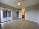 Spacious main bedroom features sliding glass doors and adjoining bathroom, offering comfort and convenience at 14025 Fairway Island Dr # 335, Orlando, FL 32837