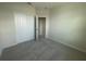 Bedroom featuring carpet and a double door closet at 1407 Mount Royal Dr, St Cloud, FL 34771