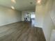 Spacious living area with staircase, tile flooring, and open layout at 1407 Mount Royal Dr, St Cloud, FL 34771