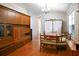 Cozy dining area featuring built-in wooden cabinets and ample natural light at 1430 Arrowhead Trl, Deltona, FL 32725