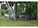 Charming home is situated on a large lot with mature trees at 1430 Arrowhead Trl, Deltona, FL 32725