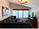 Comfortable living room with a large sectional sofa and natural light from the big window at 1430 Arrowhead Trl, Deltona, FL 32725
