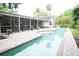 Inviting pool and screened lanai is the perfect way to enjoy the backyard at 1430 Arrowhead Trl, Deltona, FL 32725
