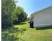 The backyard is private with a well-maintained lawn at 14844 Laguna Beach Cir, Orlando, FL 32824