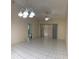 Dining area with tile flooring, a ceiling fan, and sliding glass doors that provide ample natural light and access at 14844 Laguna Beach Cir, Orlando, FL 32824