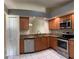Updated kitchen with granite countertops, stainless steel dishwasher and plenty of cabinet space at 14844 Laguna Beach Cir, Orlando, FL 32824