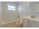 Bright bathroom features a shower-over-tub and modern vanity for comfortable living at 151 N Orlando Ave # 204, Winter Park, FL 32789