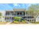 Stylish condo building features a well-maintained facade, inviting entrance, and lush landscaping at 151 N Orlando Ave # 204, Winter Park, FL 32789