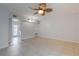 Inviting living room and dining area with tile flooring and a ceiling fan at 151 N Orlando Ave # 204, Winter Park, FL 32789
