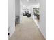 A bright and spacious hallway leading to the living area at 17199 Hickory Wind Dr, Clermont, FL 34711