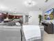 Bright living space connecting the kitchen and entertaining areas, offering a seamless flow at 17199 Hickory Wind Dr, Clermont, FL 34711