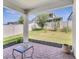 Covered backyard patio and fenced yard offer a private and inviting outdoor space at 17333 Hickory Wind Dr, Clermont, FL 34711