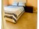 Comfortable bedroom featuring a queen-size bed, bedside tables, and carpeted flooring, providing a relaxing retreat at 17517 Silver Creek Ct, Clermont, FL 34714