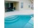 Sparkling pool and patio area, perfect for relaxing and entertaining at 17517 Silver Creek Ct, Clermont, FL 34714