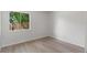 This cozy bedroom features sleek, modern hardwood floors and plenty of natural light at 1816 Haperon St, Apopka, FL 32703