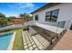 Modern home backyard with an in-ground pool and glass balcony at 182 N Phelps Ave, Winter Park, FL 32789