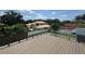 Overhead shot shows beautiful deck overlooking the pool and yard in a desirable neighborhood at 182 N Phelps Ave, Winter Park, FL 32789