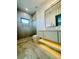 Modern bathroom features a glass-enclosed shower and floating vanity at 182 N Phelps Ave, Winter Park, FL 32789