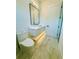Well lit modern bathroom featuring a floating vanity, and sleek lighting at 182 N Phelps Ave, Winter Park, FL 32789