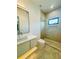 Modern bathroom with sleek vanity, glass-enclosed shower, and contemporary fixtures at 182 N Phelps Ave, Winter Park, FL 32789