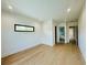 Bright bedroom with wood floors and modern lighting at 182 N Phelps Ave, Winter Park, FL 32789