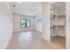 This bedroom boasts a walk-in closet, recessed lighting, and hardwood floors at 182 N Phelps Ave, Winter Park, FL 32789