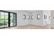 Bright living room with natural light, hardwood floors, and modern windows at 182 N Phelps Ave, Winter Park, FL 32789