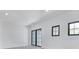 Spacious living room with recessed lighting and modern doors at 182 N Phelps Ave, Winter Park, FL 32789