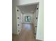 Office featuring hardwood floors and a large window with backyard views at 182 N Phelps Ave, Winter Park, FL 32789