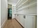 Spacious pantry features ample shelving, white cabinets, and a built-in wine fridge at 182 N Phelps Ave, Winter Park, FL 32789
