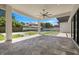 Outdoor living area with pavers, steps to the pool, seating, and spacious area for entertaining at 182 N Phelps Ave, Winter Park, FL 32789