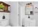 Clean bathroom featuring a shower, sink, and decorative accents at 1901 10Th St, St Cloud, FL 34769