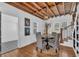 Inviting dining room featuring a round table, wooden floors, and natural light at 1901 10Th St, St Cloud, FL 34769