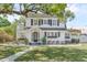 Charming two-story home with a well-manicured lawn and lovely landscaping at 1901 10Th St, St Cloud, FL 34769