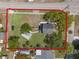 Aerial view of the home with a visual representation of the property lines at 1901 10Th St, St Cloud, FL 34769