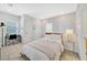 Spacious bedroom with a dedicated workspace, modern decor, and a cozy ambiance at 2110 Hillcrest St, Orlando, FL 32803