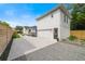 View of the side of the house with an extra-long driveway that leads to a two-car garage at 2110 Hillcrest St, Orlando, FL 32803