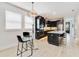 Bright kitchen features a large island with seating and pendant lighting, creating a great eating space at 2110 Hillcrest St, Orlando, FL 32803