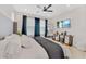 Modern main bedroom with a coastal themed tv and decor at 2110 Hillcrest St, Orlando, FL 32803