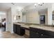 This bathroom features a double vanity, two mirrors, tile floors, and a large walk-in closet at 2136 J Lawson Blvd, Orlando, FL 32824